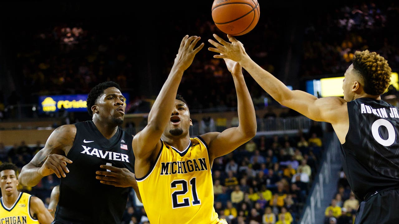 Sharpshooting Xavier wins at No. 24 Michigan